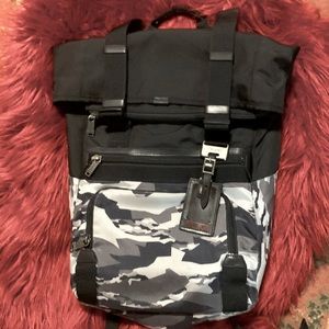 TUMI snow camo zip/roll-top backpack
